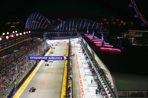 thrilling-race-action-as-the-cars-head-down-the-pit-straight-min-opt.jpg